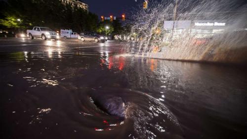 Water swirls down a storm drain at 600 South and State Street after heavy rain hit northern Utah on Aug. 1, 2021. Salt Lake City Department of Public Utilities opened a new "Adopt a Storm Drain" program to help clean up residential drains last week. (Scott G Winterton, Deseret News)