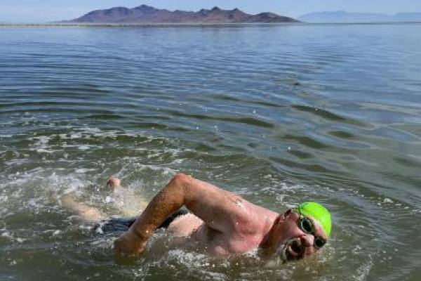 Lane Henderson, of Riverton, competes in a 1-mile open swim competition at Great Salt Lake State Park in Magna on Saturday, June 11, 2022.Laura Seitz, Deseret News