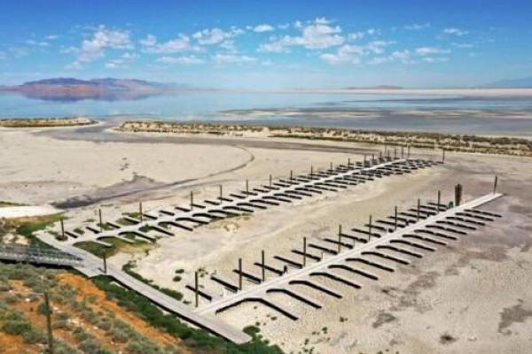 Record low water levels are seen in the Great Salt Lake by the Antelope Island marina on Friday, July 22, 2022. State leaders are working on solutions to help restore the lake. Photo: Kristin Murphy, Deseret News