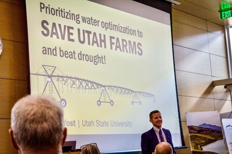 Utah State University's Matt Yost presents his findings on water-saving irrigation technology for agriculture, Aug. 4, 2022. Photo: Saige Miller, KUER