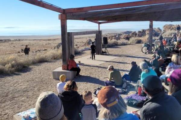 Participants read parts of a praise poem to Great Salt Lake near the Antelope Island visitor center. | Aimee Van Tatenhove