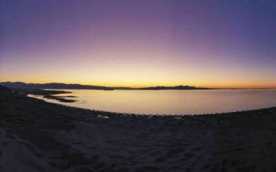 A panoramic photo shows the sun setting over the Great Salt Lake on Saturday, Sept. 24, 2022. This photo was made with a drone which stitched together multiple photos, creating a single one.Ben B. Braun, Deseret News