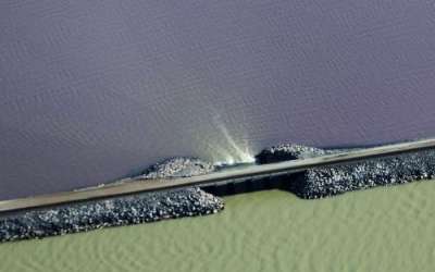 The railroad causeway is breached on the Great Salt Lake on Wednesday. (Photo: Jeffrey D. Allred, Deseret News)