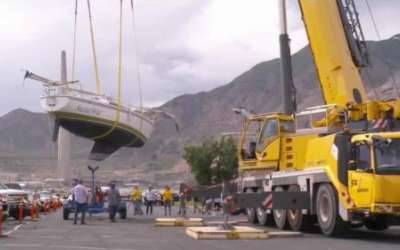 A giant crane lifted larger boats back into their slips at the Great Salt Lake marina Tuesday, a fantastic sign that water levels continue to look promising. (Photo courtesy FOX 13 News).