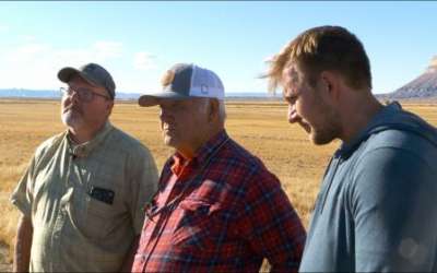 Nathan Thayn (left), Lee Thayn (middle) and Ross Thayn (right), are some of the few full-time farmers in Green River, Utah. They are shown on their property in October 2023. They grow alfalfa and corn and participated in an experiment by the Upper Colorado River Commission to fallow a field to save water. Manuel Rodriguez, FOX 13 News. 