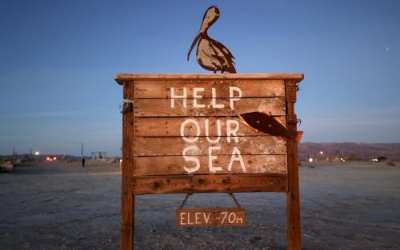 A sign by artist Keith Jones is one of many art installations on display on the shores of the Salton Sea in Bombay Beach, Calif., on Friday, Dec. 15, 2023. Kristin Murphy, Deseret News