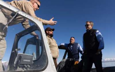 John Luft, program manager of the Great Salt Lake Ecosystem Program, and Kyle Stone, wildlife biologist for the Division of Wildlife Resources, speaks with Rep. Blake Moore and Rep. Jimmy Panetta during a tour of the Great Salt Lake in Willard on Monday, March 18, 2024. | Marielle Scott, Deseret News
