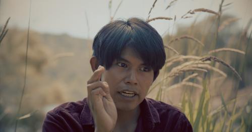 A still of Joshua Dixon, a member of the Navajo Nation, from the film ‘The Illusion of Abundance,’ where he explains the connection many Native people have with the land. 